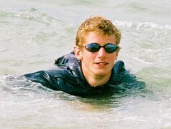 swimming in hoodie, jeans and t-shirt