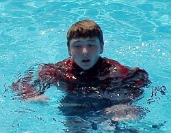 swimming in dark clothes