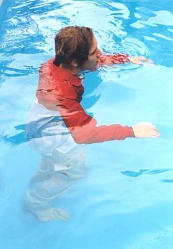 Wading in the pool fully clothed