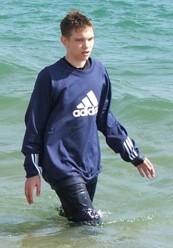 Swimming Training in Tracksuit